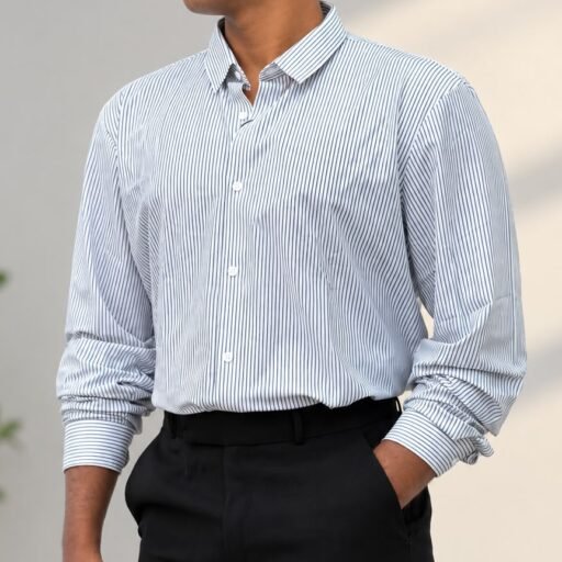 Mishab, digital marketing expert in Calicut, wearing a striped shirt”